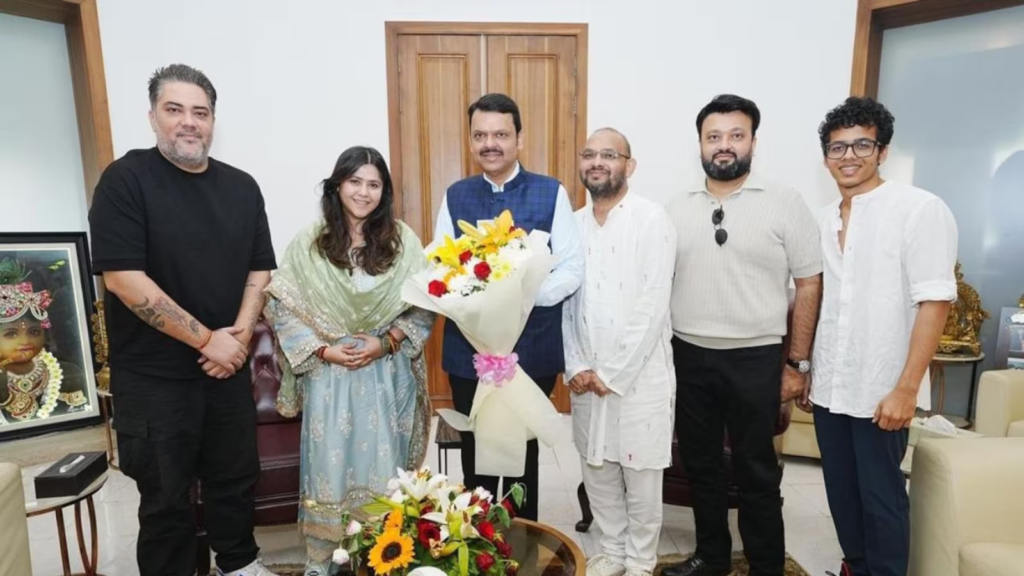 "The Sabarmati Report celebrates success with Devendra Fadnavis after victory."